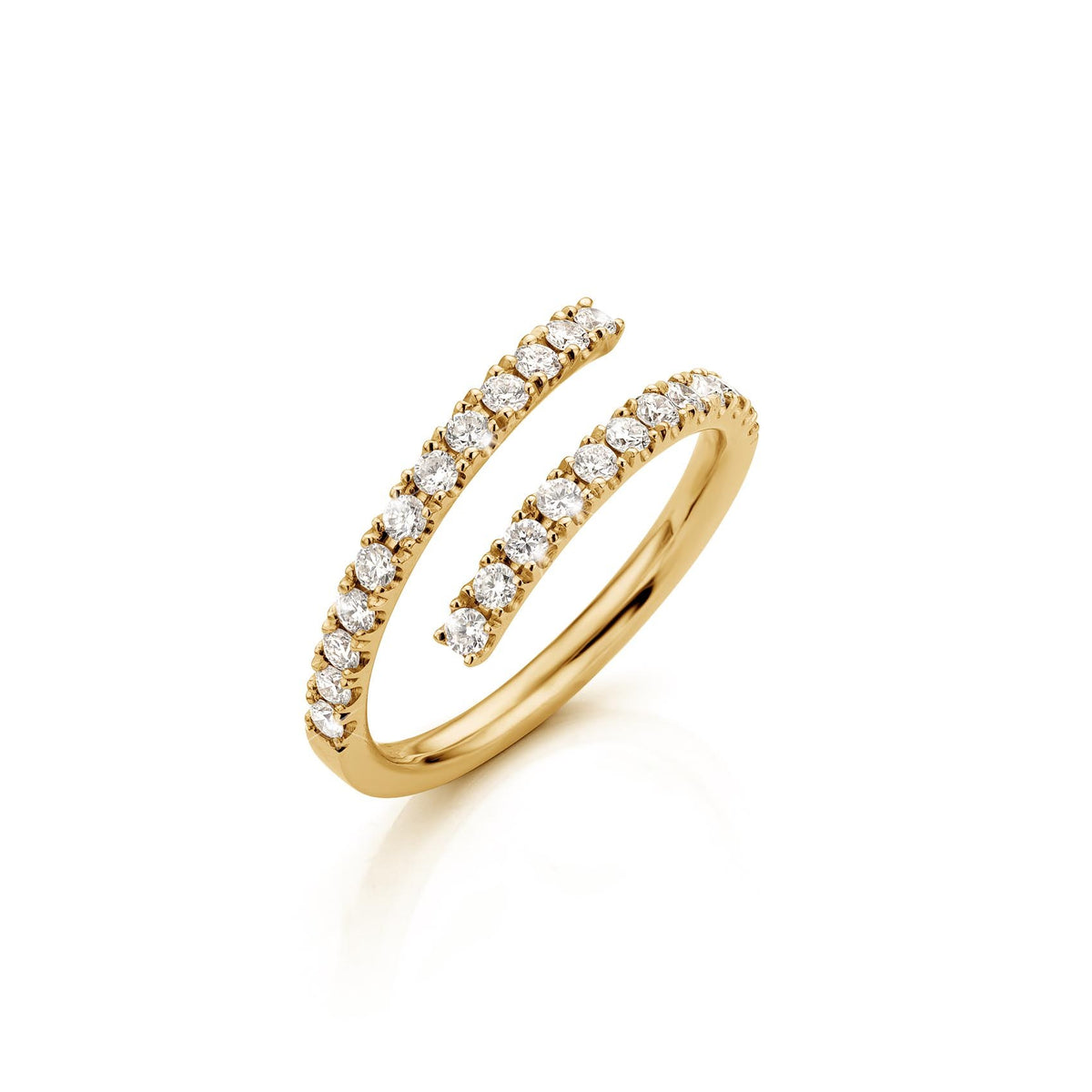 Vela diamond bypass ring in yellow gold, angled view